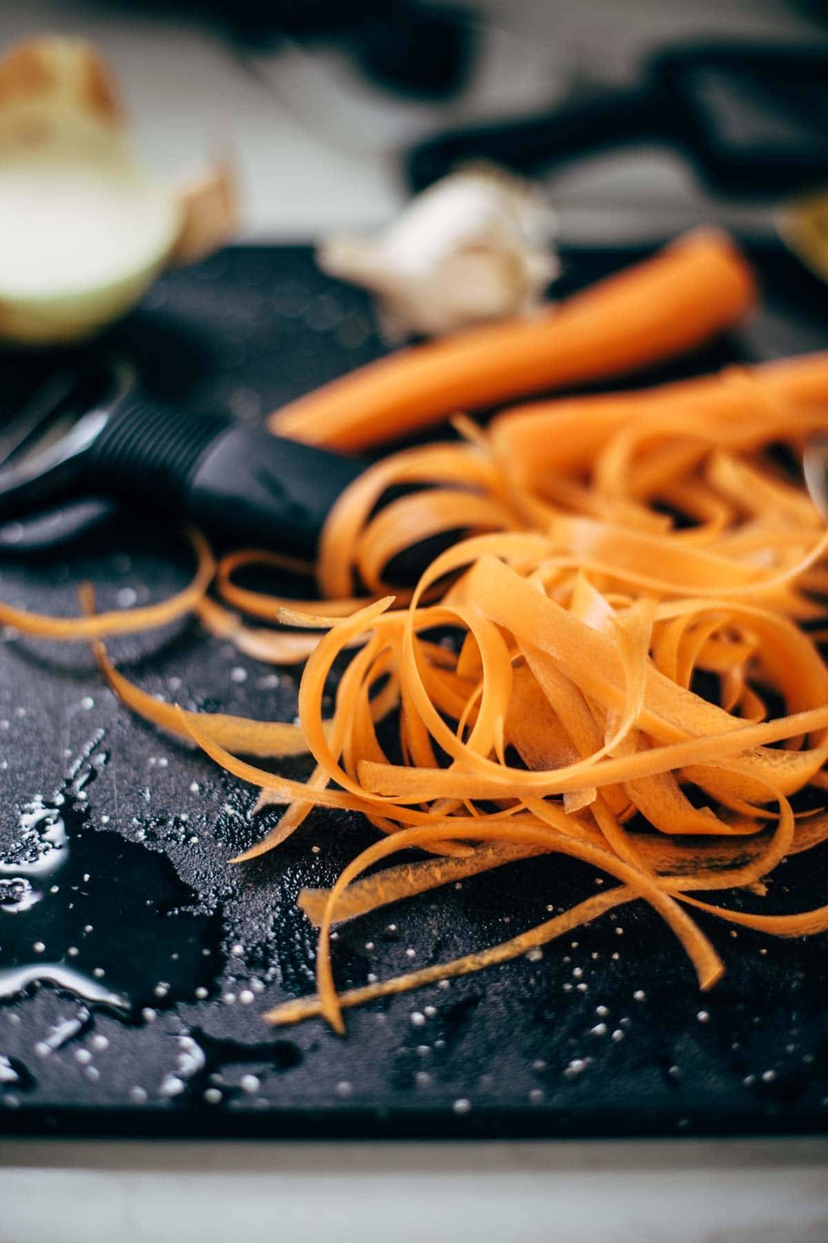 Peeled carrots on a cutting board