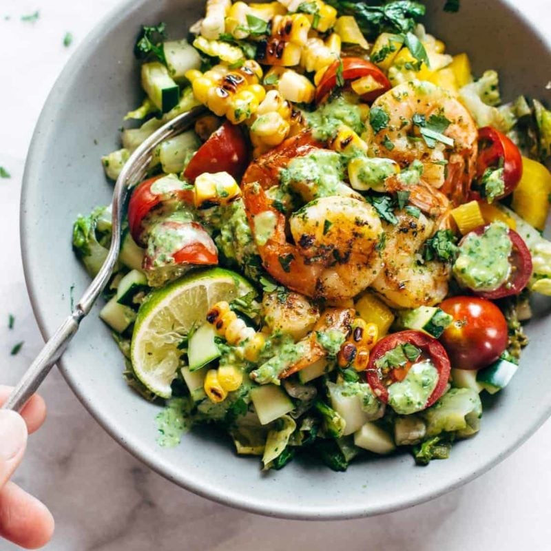 Glowing Grilled Summer Detox Salad in a bowl with a fork.