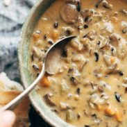 Instant Pot Wild Rice soup in bowl with spoon.