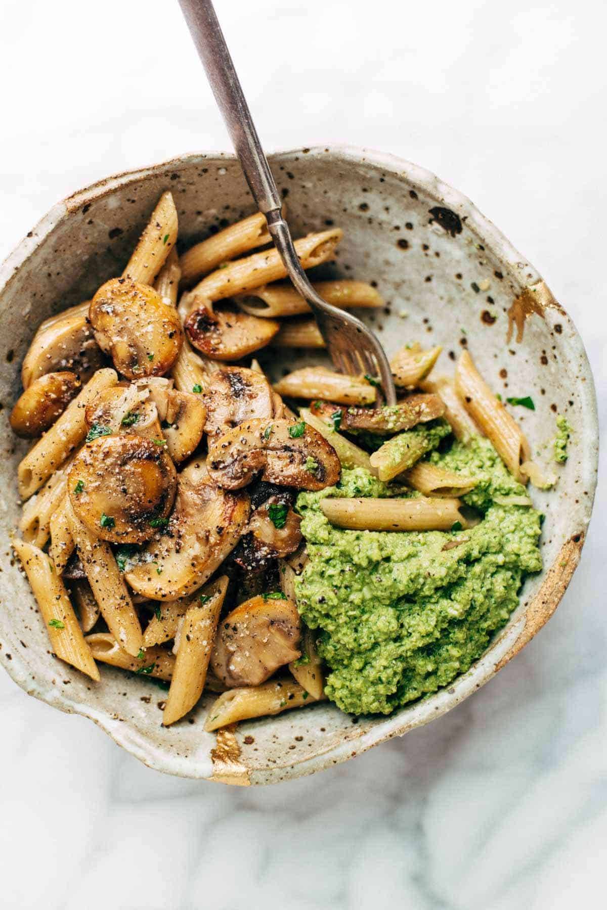 Simple Mushroom Penne with Walnut Pesto - made with easy ingredients like Parmesan cheese, whole wheat penne, mushrooms, garlic, and butter. Vegetarian. | pinchofyum.com