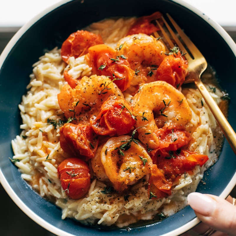 A picture of Garlic Shrimp and Tomatoes with Parmesan Orzo